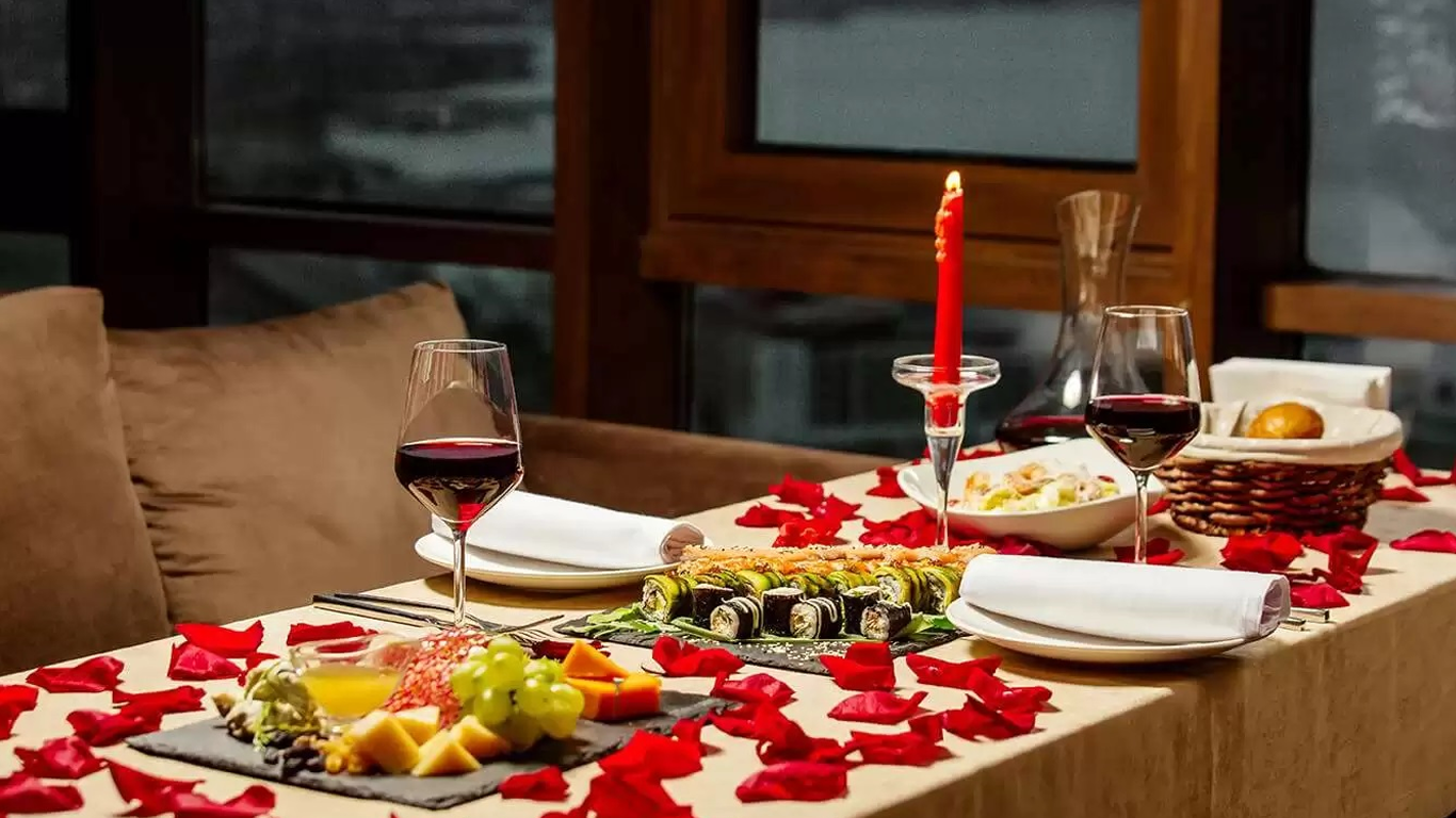 lunch table with red wine candles